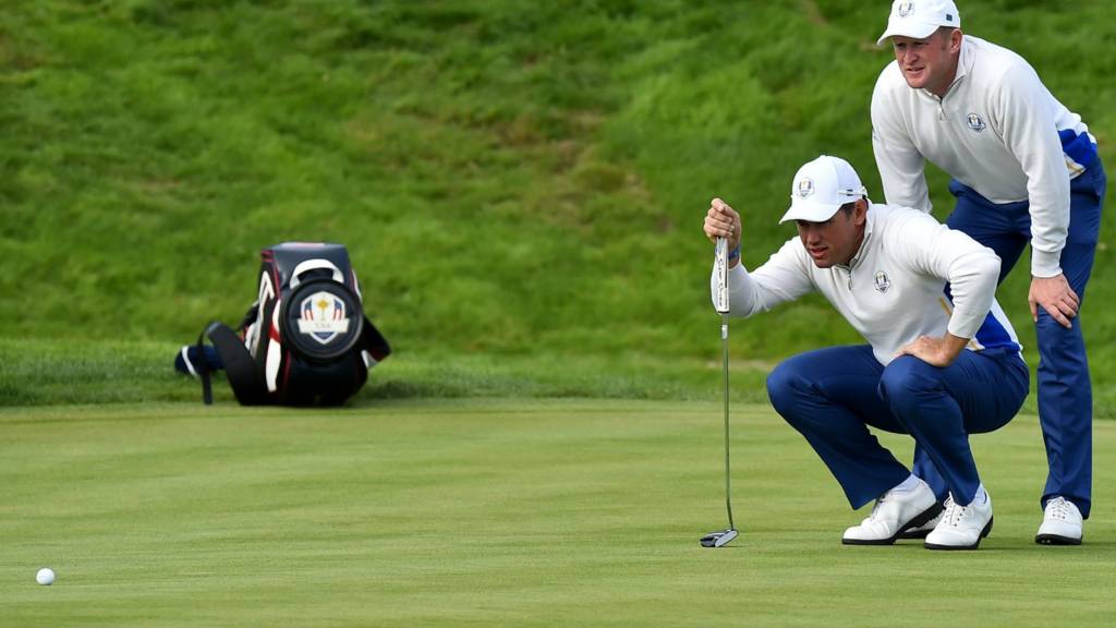 Team Europe's Lee Westwood of England and Jamie Donaldson of Wales