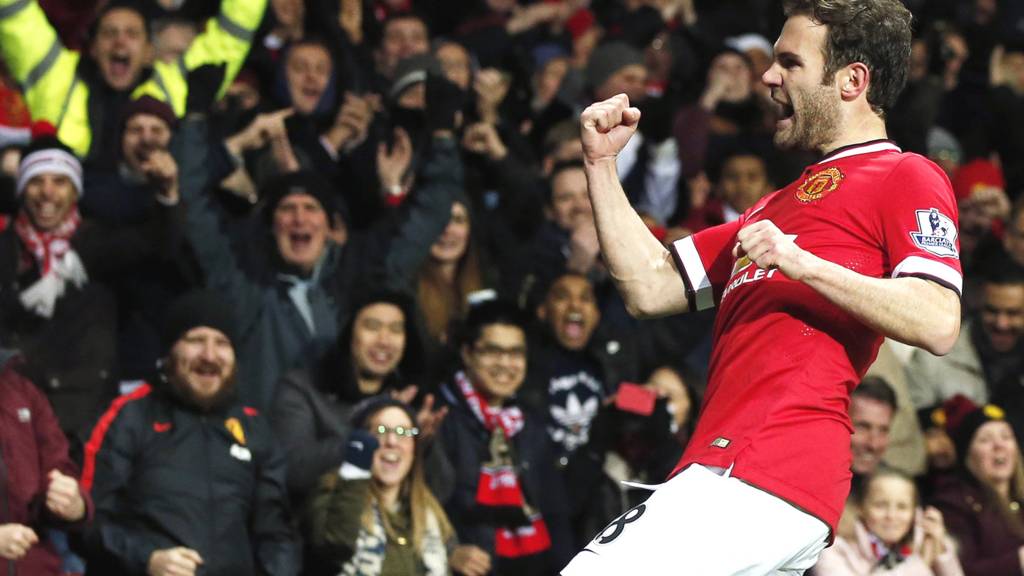 Manchester United midfielder Juan Mata celebrates