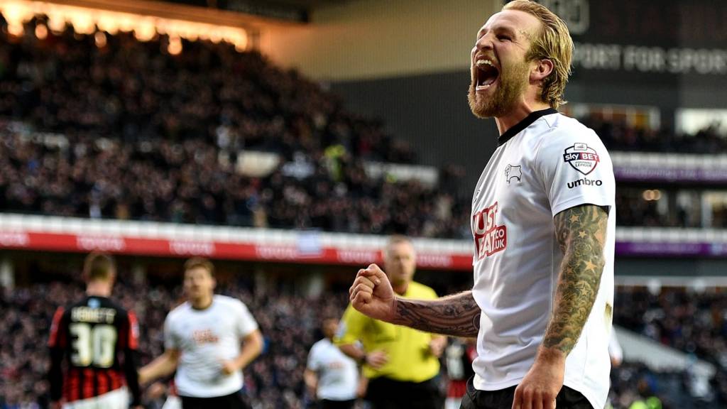 Johnny Russell celebrates