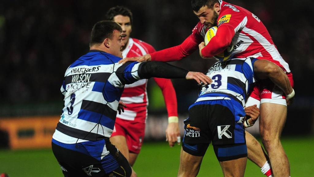 Jonny May is tackled