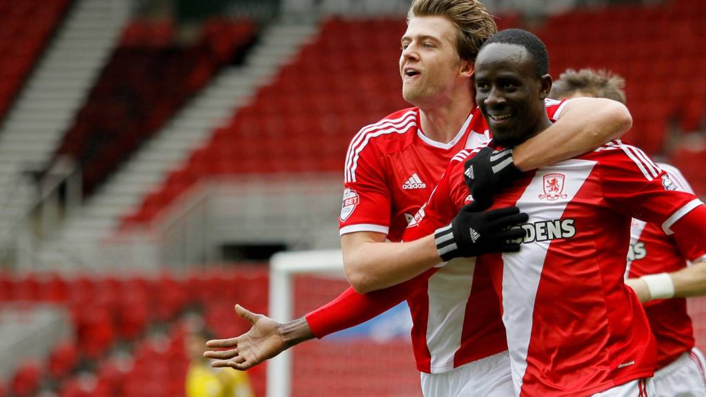 Albert Adomah celebrates with Middlesbrough's Patrick Bamford
