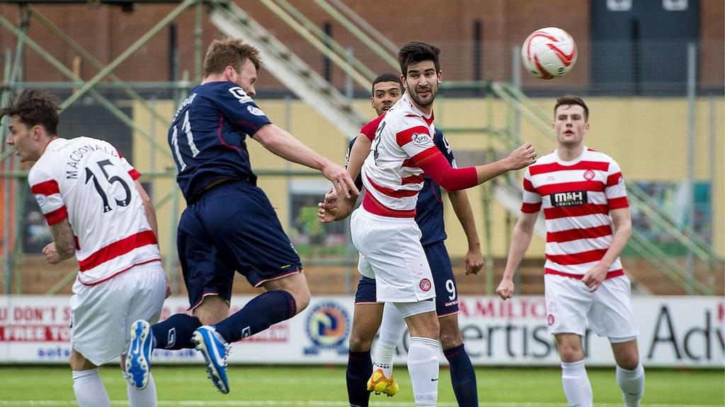 Craig Curran heads Ross County's leveller