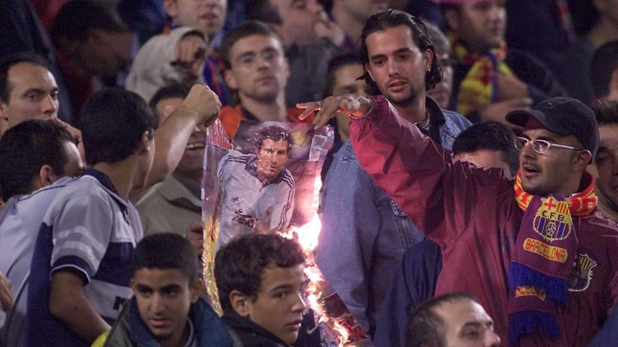 Barcelona fans burn a picture of Luis Figo