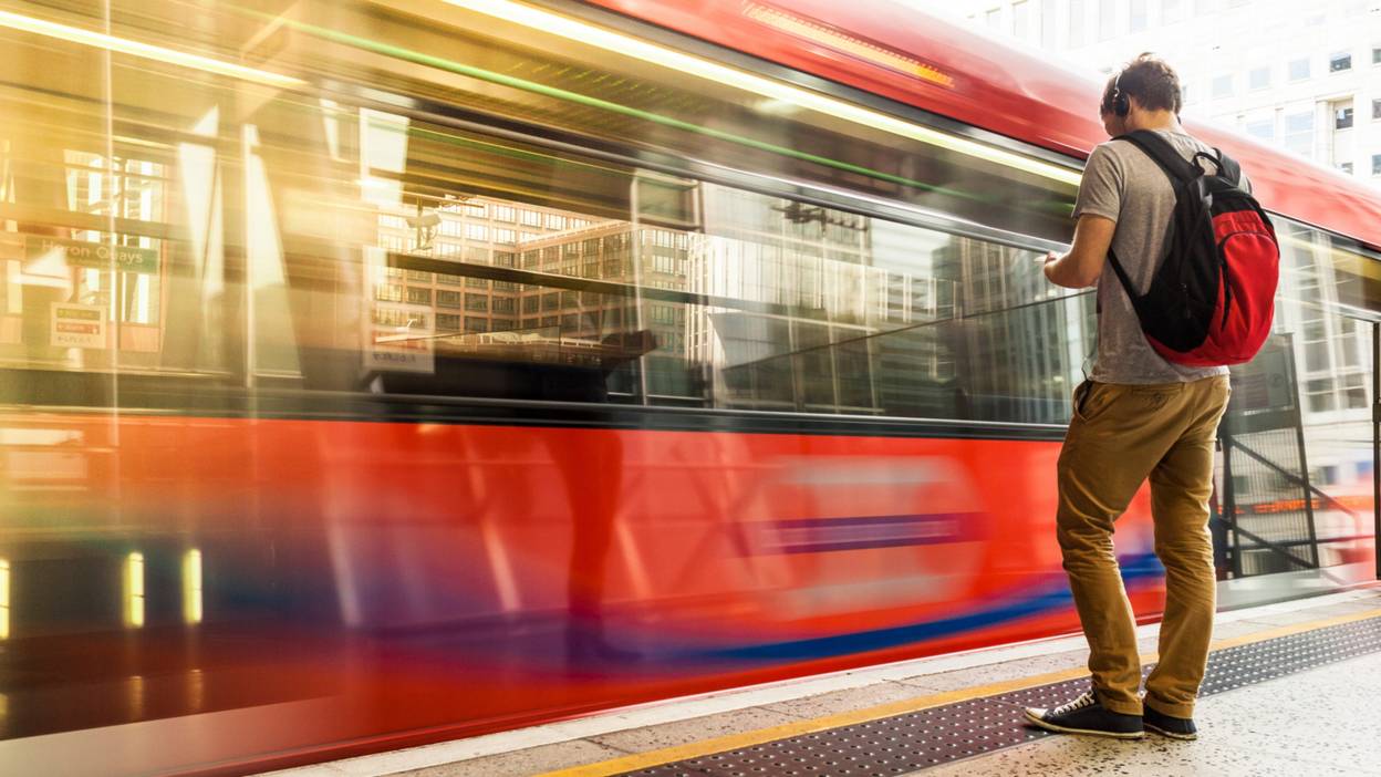 Man waiting for train.