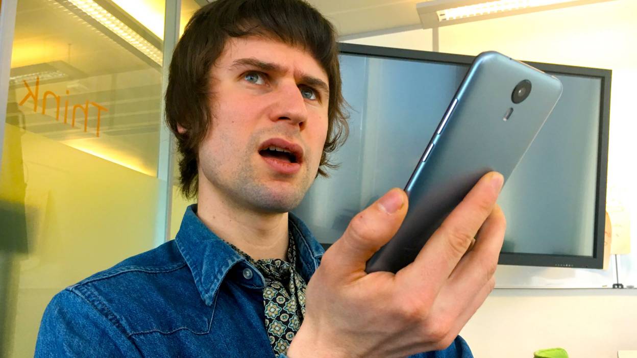 Ciaran Varley looks confused by phone