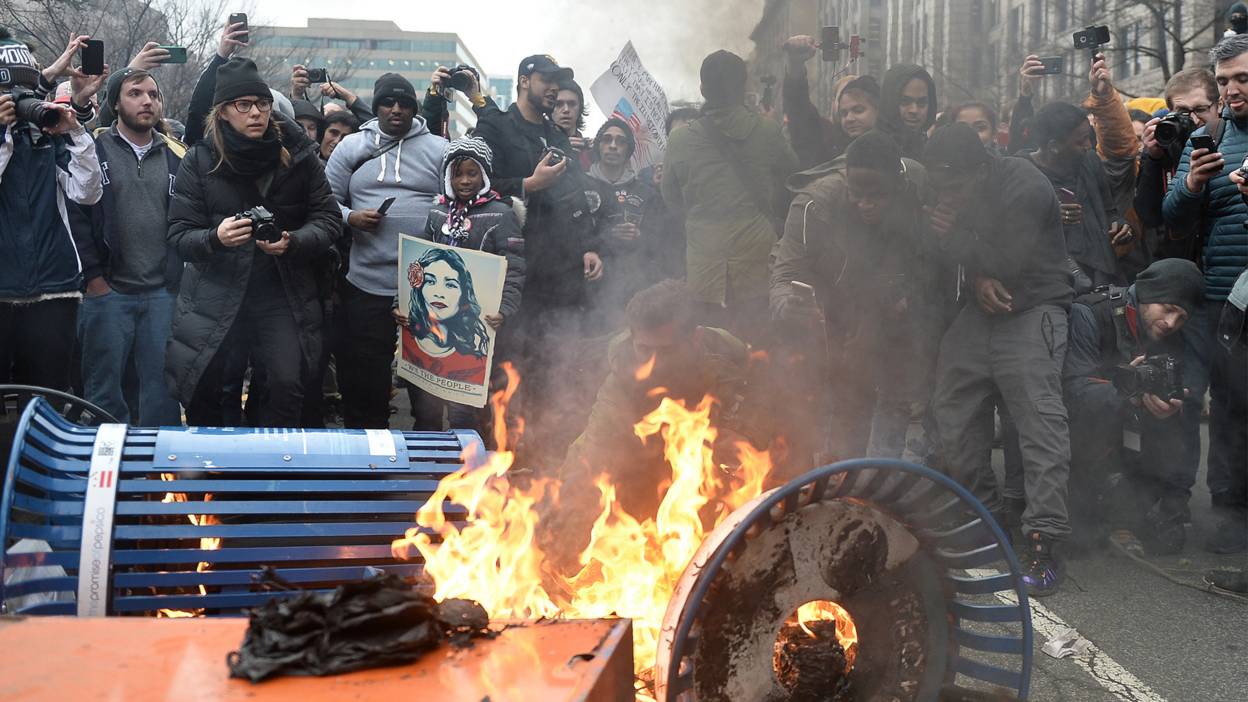 Protesters set fires in protest against the inauguration of President Donald Trump.