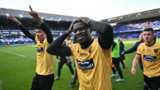 Maidstone United players celebrate the FA Cup win over Ipswich Town