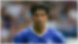 Blurred image of a footballer