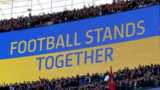 A screen saying Football Stands Together at Wembley in a show of support for Ukraine before the Carabao Cup final