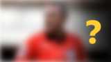 A blurred image of a referee (for 5 May daily quiz)