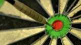 A dart in the bullseye of a darts board