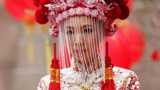 Woman in traditional Chinese wedding clothes