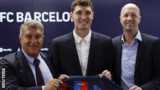 Barcelona president Joan Laporta with Andreas Christensen and sporting advisor Jordi Cruyff