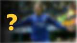 A blurred image of a footballer