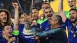 Maurizio Sarri and Chelsea players with the Europa League trophy