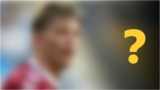 A blurred image of a footballer (for 4 December daily World Cup quiz)