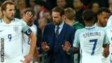 Gareth Southgate talks to his England players