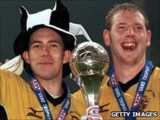 Marc Bridge-Wilkinson (left) and Steve Brooker hold the LDV Vans trophy after Port Vale's 2001 win