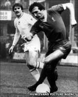 Robbie James (left) playing against Liverpool