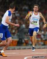 Andrew Steele (right) in the Beijing 4x400m relay