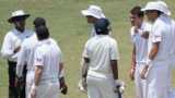England players argue with the umpire as James Anderson remonstrates with Dilruwan Perera of Sri Lanka
