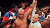 George Foreman wins the title again in 1994