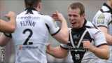 Paddy Flynn (l) and Cameron Phelps celebrate Widnes' win over Wigan in March