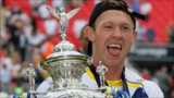 Micky Higham lifts the Challenge Cup trophy for Warrington