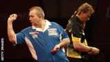 Phil Taylor (l) and Simon Whitlock