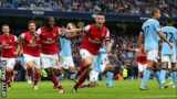 Laurent Koscielny celebrates his goal for Arsenal against Manchester City on Sunday