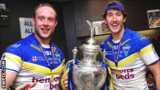 Warrington's Chris Hill (l) and Stefan Ratchford with the Challenge Cup trophy