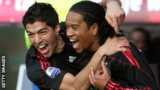 Luis Suarez and Urby Emanuelson