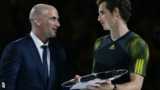 Andrew Agassi presents Andy Murray with his runners-up prize