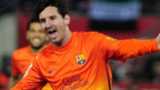 Lionel Messi celebrates scoring for Barcelona