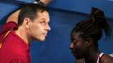 Ricky Simms (left) with Christine Ohuruogu