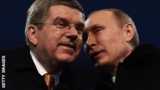 Vladimir Putin chats to Thomas Bach during the opening ceremony