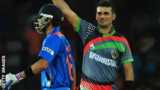 Afghanistan's Dawlat Zadran celebrates dismissing India's Virat Kohli in 2012