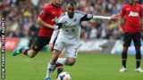 Leon Britton in action for Swansea City against Manchester United