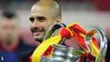 Pep Guardiola with the Champions League trophy for Barcelona at Wembley in 2011