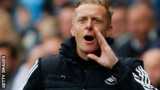 Swansea coach Garry Monk shouts instructions to his players