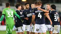 Last-gasp own goals give Millwall draw at Swansea