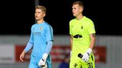 Goalkeeping brothers bring family rivalry to pitch