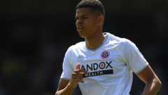 Derby sign Blades striker Osula on loan