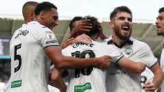 Swansea cruise to victory over poor Hull