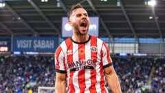 Blades go top of Championship with win at Cardiff