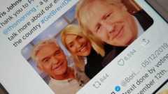 Boris Johnson tweet on a phone