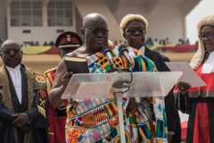 The winner of Ghana's presidential election Nana Akufo-Addo (C) takes the oath of office during the swearing-in as elected President of the fourth Republic of Ghana