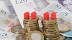 Monopoly pieces on cash