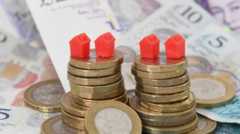 Cash and monopoly pieces