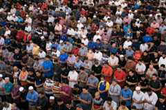 Malaysian Muslims perform Friday prayer